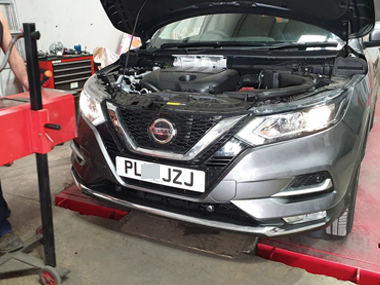 Nissan Qashqai from Granada region has pre import check at our workshop Nissan Qashqai on ramp at our workshop